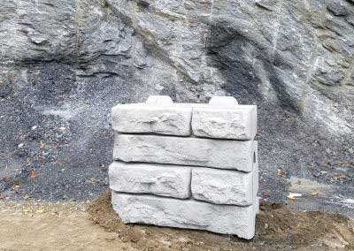 01 Before, Redi-Rock is placed for our color expert's transformation to exposed rock on Mount Mansfield, Stowe, VT